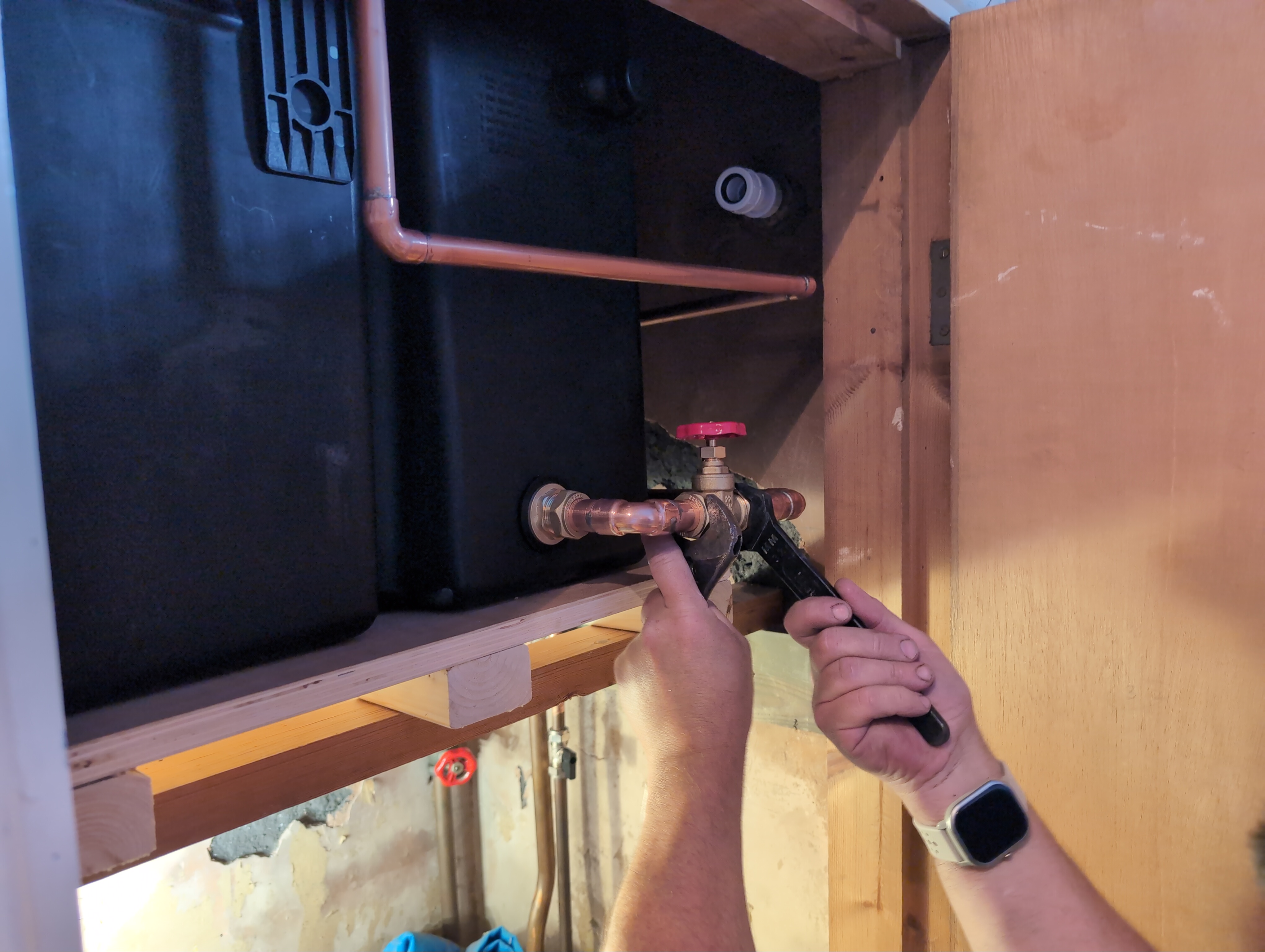 Installing new heating system header tank